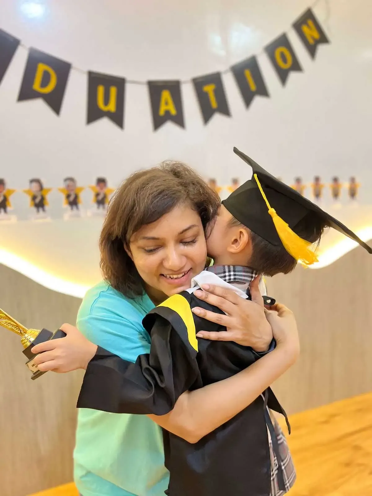 Mishantini with a child during a lesson at the centre